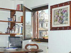 (e) view from the door bringing to the sitting room (same perspective as photo a)